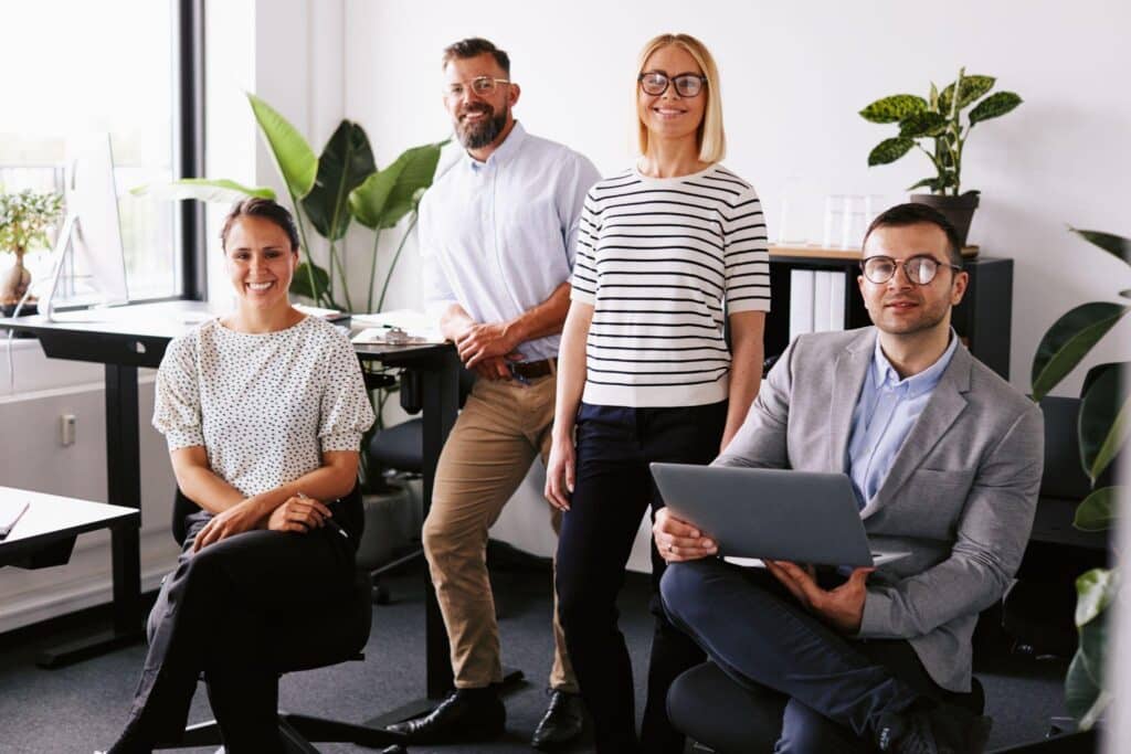 Digital marketing agency team in St. Petersburg working together on SEO, website design, and PPC strategies for local business clients.