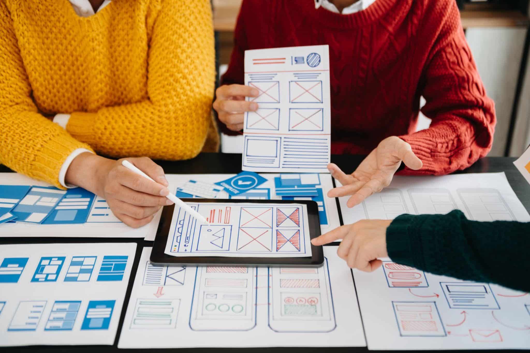 Small business website design in St Petersburg discussing the benefits of WordPress vs Wix with mobile wireframes.